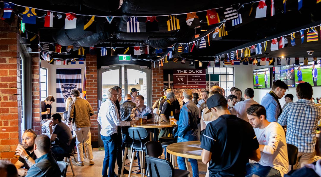 A busy bar scene at The Duke Sports Bar
