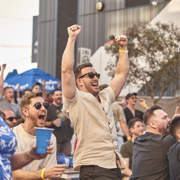 Fan's cheering while watching a sports game