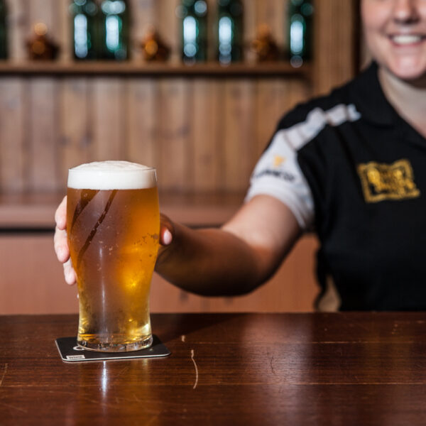 pint being served in a pub