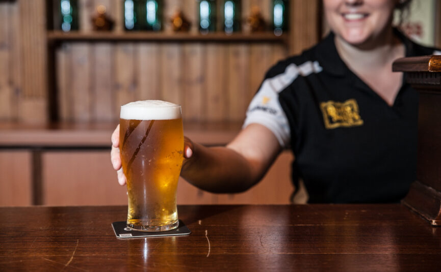 pint being served in a pub