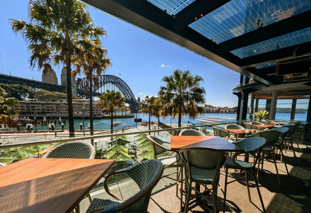 Harbour bridge in the background of a venue.